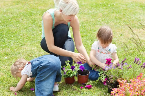 Keyboard and screen-reader support icons overlayed on a garden service page mockup for Hendon gardeners